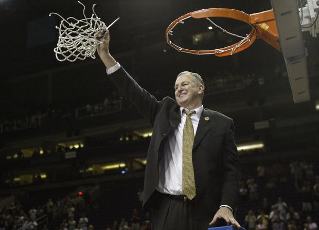  Jim Calhoun of the University of Connecticut Huskies celebrates by cutting dow 