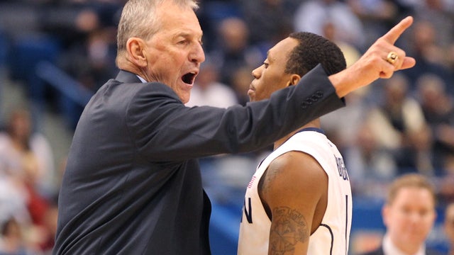 Jim Calhoun offers instruction to Shabazz Napier  