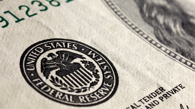 Federal Reserve logo on currency 