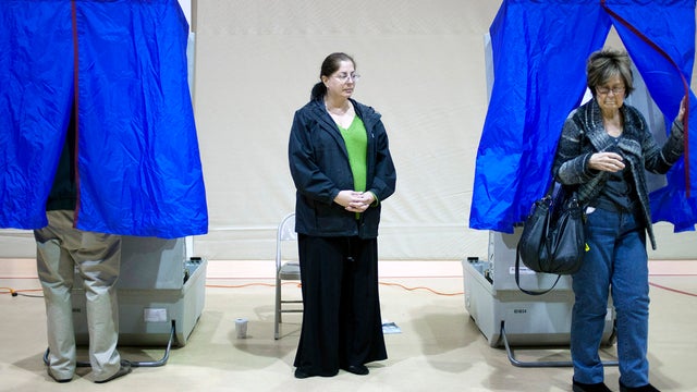 Voters cast their ballots during the Republican primary election at Bethel Springs Elementary School April 24, 2012, in Bethel Township, Pa. 