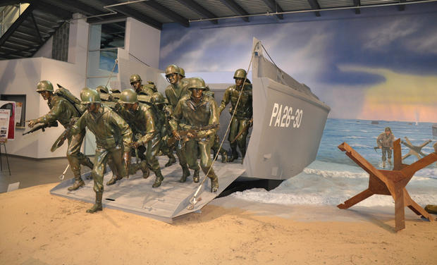 bronze-sculpture-of-d-day-invasion-by-fred-hoppe-jr-the-sand-was-shipped-in-from-normandy-murals-by-david-reiser.jpg 