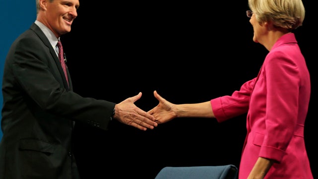 Republican U.S. Sen. Scott Brown, left, shakes hands with his Democratic challenger Elizabeth Warren prior to debate sponsored by the Boston Herald at the University of Massachusetts in Lowell, Mass., Monday, Oct. 1, 2012. 