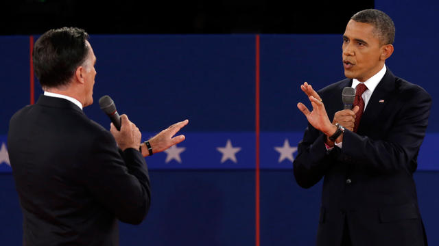 Republican presidential nominee Mitt Romney and President Barack Obama spar during the second presidential debate 