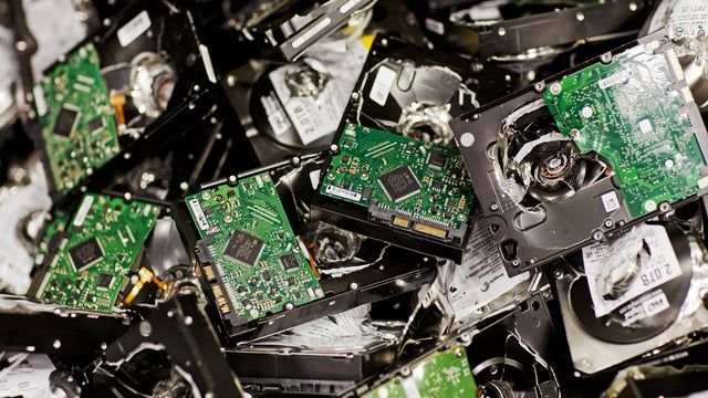 Hard drives that fail are wiped then destroyed on site. Here's a pile of some that were spiked by the Google procedure. 