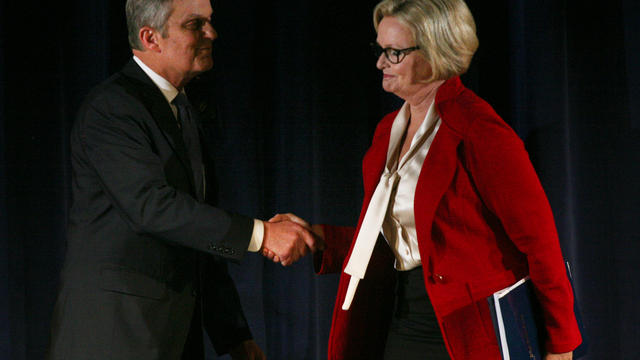 Republican Rep. Todd Akin and Democratic Sen. Claire McCaskill shake hands after the end of the second debate in the Missouri Senate race Thursday, Oct. 18, 2012, in Clayton, Mo. 