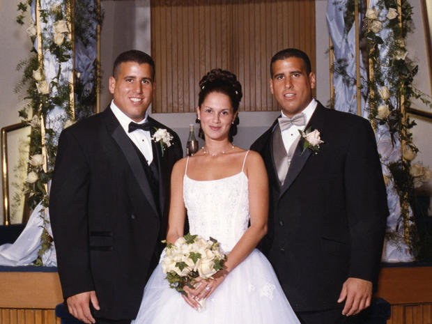 Adam and Lina Kaufman on their wedding day, with Adam's twin brother, Seth. 