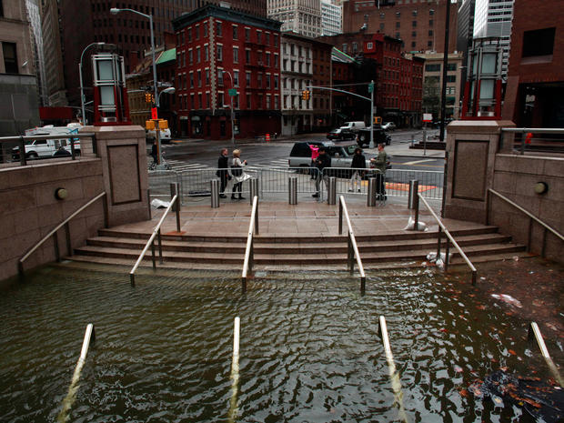 Water floods the Plaza Shops in the wake of Hurricane Sandy 