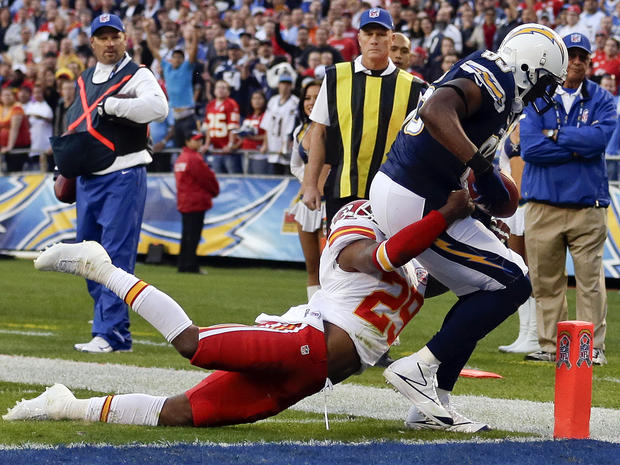 San Diego Chargers tight end Antonio Gates, right, scores a touchdown on a 14-yard pass as Kansas City Chiefs strong safety Eric Berry attempts to tackle him during the first half of their NFL football game Nov. 1, 2012, in San Diego. 
