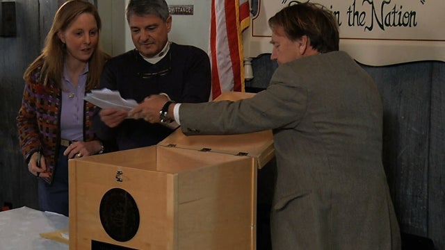 Still frame made from video shows ballots being removed from ballot box, to be counted in Dixville Notch, N.H., Tuesday 