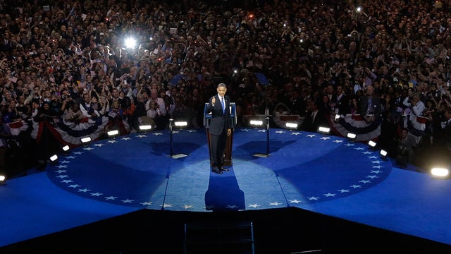 President Barack Obama acknowledges the crowd at his election night party 