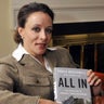 Paula Broadwell, author of the David Petraeus biography 'All In,' poses for photos in Charlotte, North Carolina 