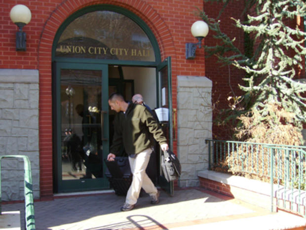 FBI Agency Carries Items Out Of Union City City Hall 