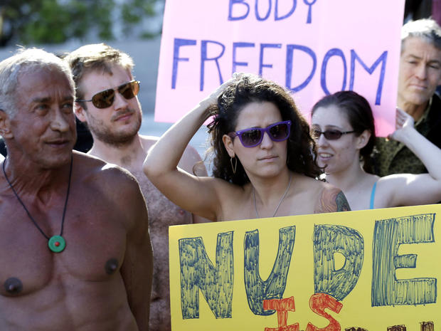 Demonstrators gather outside of City Hall in San Francisco for a protest against a proposed city-wide nudity ban, Wednesday, Nov. 14, 2012. 