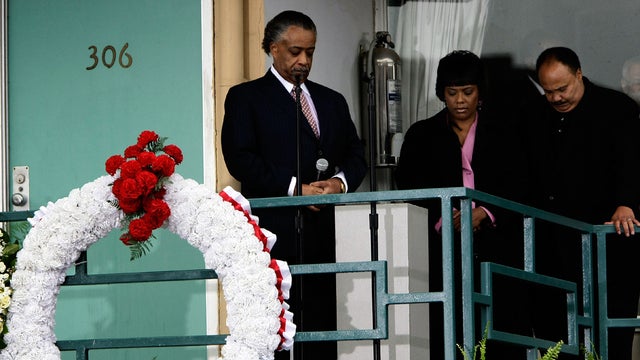 Martin Luther King III, right, and his sister Bernice observe a moment of silence with the Rev. Al Sharpton at 6:01 p.m., the moment Martin Luther King Jr. was shot on the balcony of the Lorraine Hotel in Memphis, Tenn., April 4, 2008, the 40th anniversar 