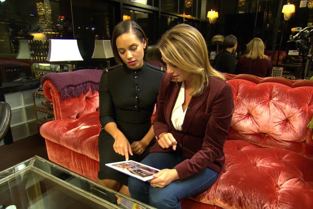 Alicia Keys shows Lara Logan an app she designed, called "The Journals of Mama Mae and Lee Lee." 