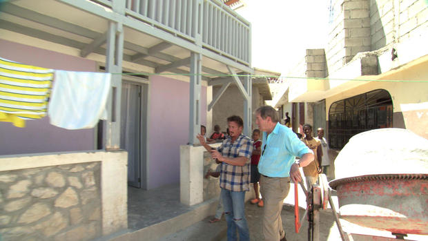 Sean Penn shows Charlie Rose J/P HRO's first model house, built in a poor Port au Prince neighborhood which was wiped out by the earthquake. 
