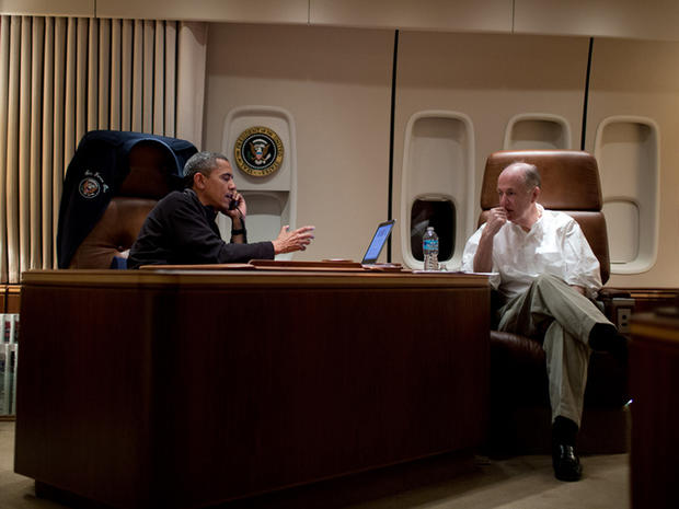 President Obama, aboard Air Force One, talks on the phone with Egyptian President Mohammed Morsi 
