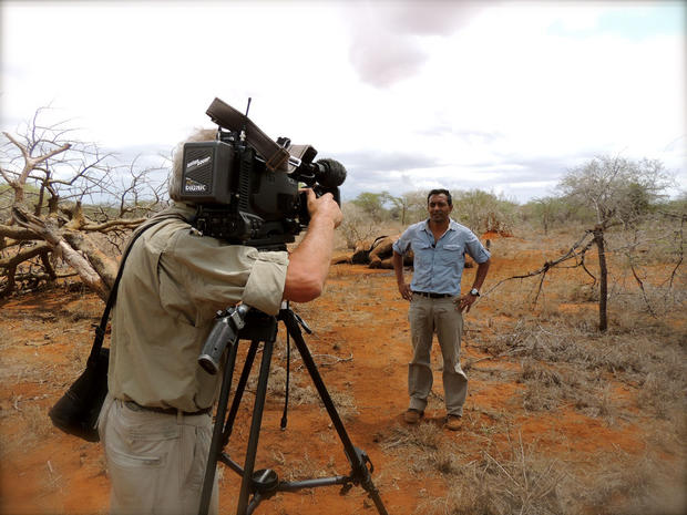 CBS News cameraman Wim DeVos shoots a standup with Science Contributor M  Sanjayan. 