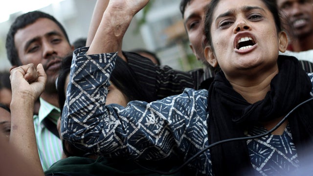 Bangladeshi garment workers protest Nov. 27, 2012, to mourn the deaths of the victims of a fire in a garment factory on the outskirts of Dhaka, Bangladesh. 