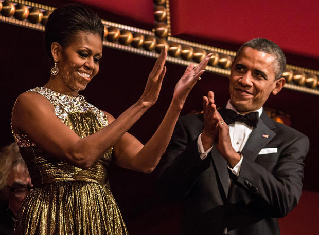 U.S. President Barack Obama and first lady Michelle Obama attend the Kennedy Center Honors at the Kennedy Center on December 2, 2012 in Washington, DC. 