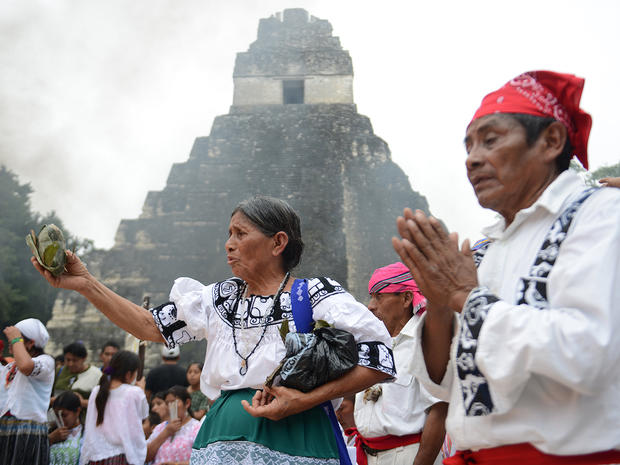 Mayan shamans take part in a ceremony on December 21, 2012, celebrating the end of the Mayan calendar, at the Tikal archaeological site, north of Guatemala City. 