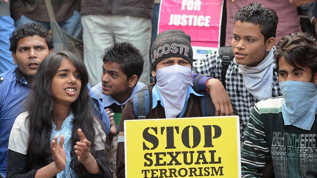 Indian demonstrators hold placards as they shout anti-government slogans during a protest calling for better safety for women following the rape of a student in New Delhi on December 24, 2012.  