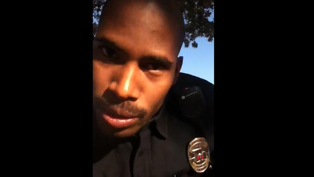 This screenshot taken from a cell phone video by 17-year-old Jordan Rojas shows Officer Disraeli Arnold confronting the camera and saying his name. 