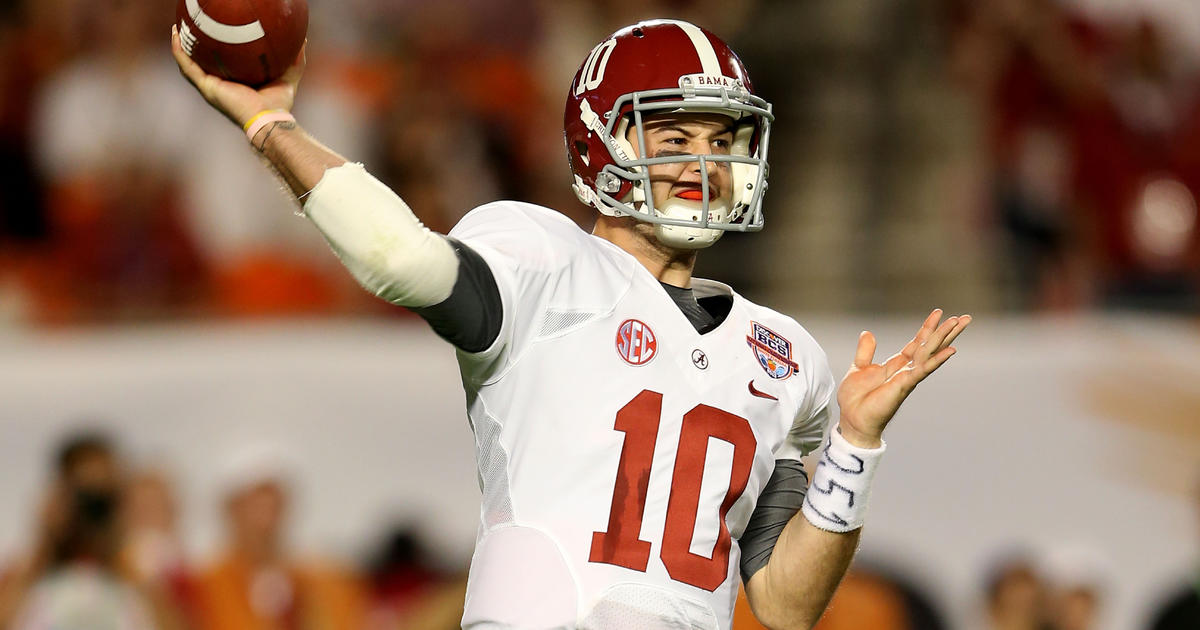 Katherine in an Alabama jersey. A.J. was a quarter back for