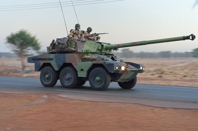 French soldiers on a Sagaie tank destroyer leave Bamako 