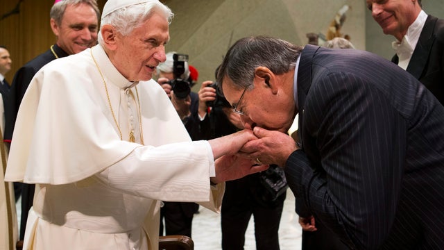 Pope Benedict XVI greets U.S. Defense Secretary Leon Panetta after the pontiff's weekly general audience in Paul VI Hall at the Vatican Jan. 16, 2013. 