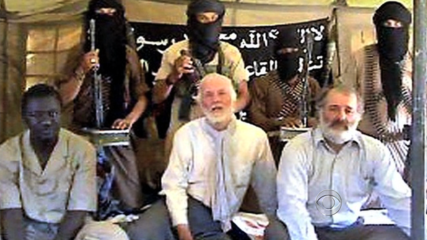 Canadian diplomat Robert Fowler (center bottom row), while he was being held hostage by Moktar Belmoktar and al Qaeda-affiliated militants 