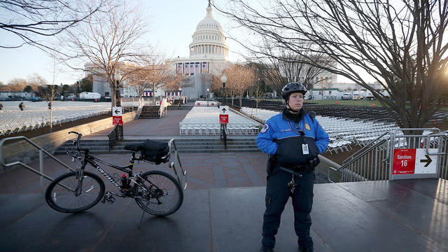 U.S. Capitol Police officer Kristin Brady stands guard in front of the U.S. Capitol Building 