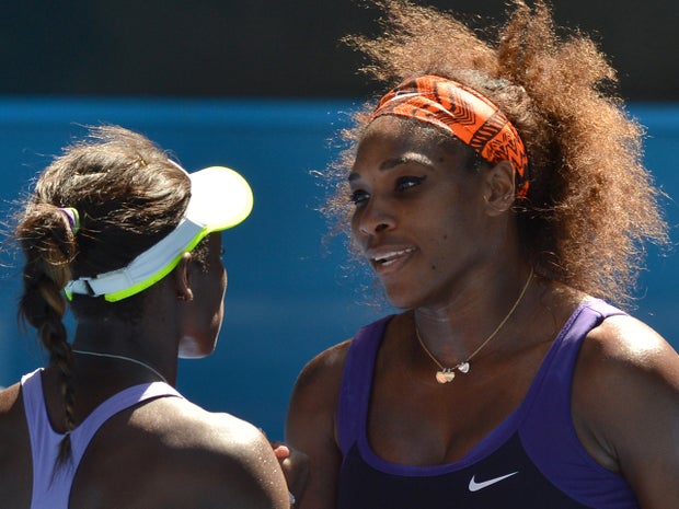 Sloane Stephens of the U.S. (left), shakes hands with Serena Williams 