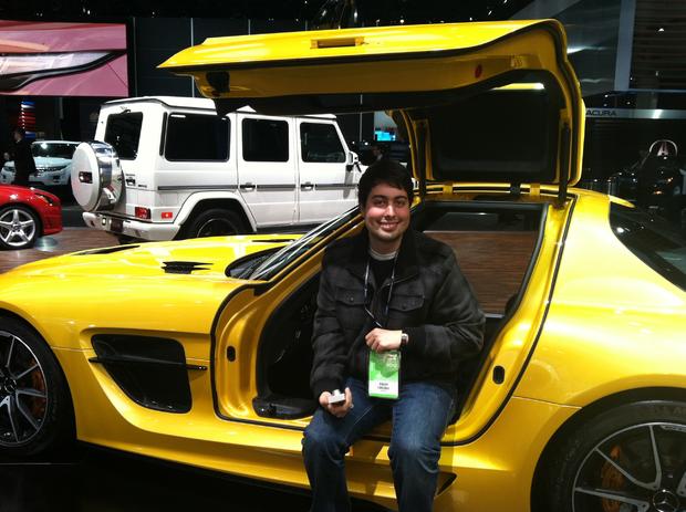 Troy sitting in the Mercedes-Benz SLS AMG Black Series 