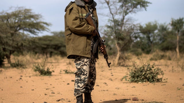 A Malian soldier takes position in Konna 