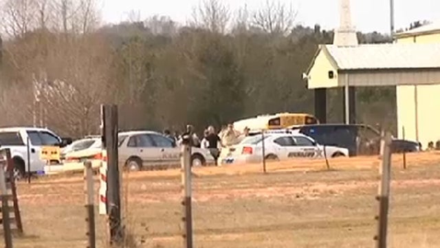Scene outside church where hostage drama unfolded Jan. 29, 2013 in Midland City, Ala. after, sheriff says, gunman killed school bus driver and took six-year-old off bus and held him 