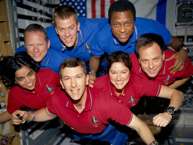 The Columbia astronauts, posing for a group photo during their 16-day science mission. Back row, left to right: David Brown, pilot William McCool, Michael Anderson. Front row, left to right: Kalpana Chawla, commander Rick Husband, Laurel Clark, Israeli flier Ilan Ramon. (CREDIT: NASA) 