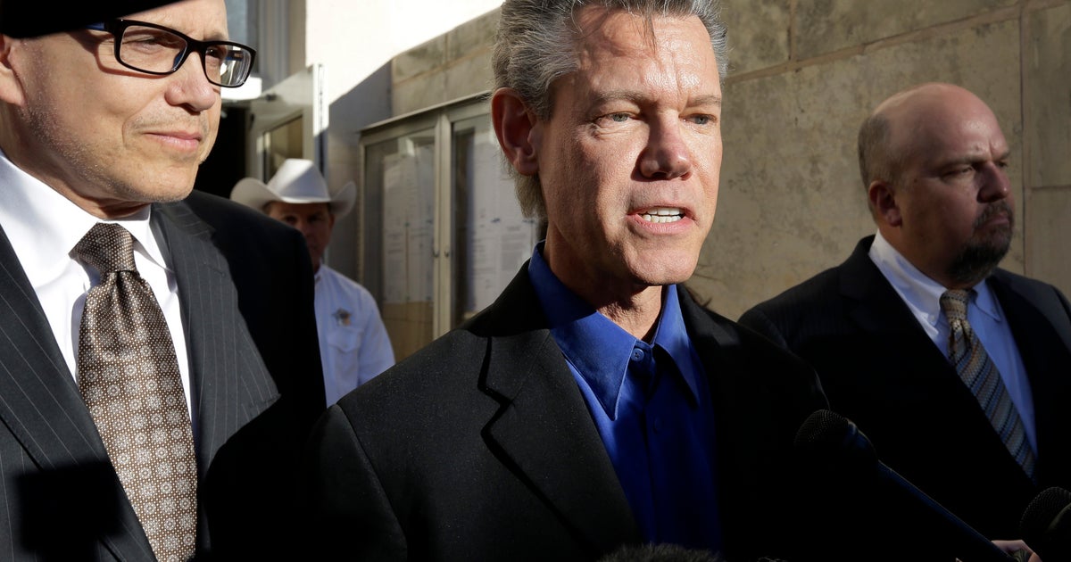 Randy Travis pleads guilty to DWI, gets probation - CBS News