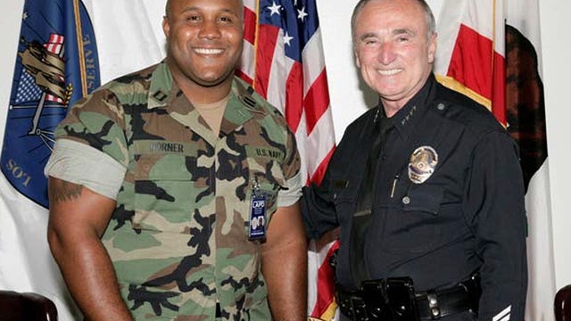 This undated photo released by the Los Angeles Police Department shows suspect Christopher Dorner, a former Los Angeles officer with former Police Chief William Bratton. 