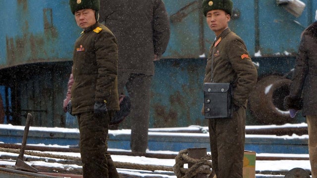 North Korean soldiers stand guard along the Yalu River at the North Korean town of Sinuiju on February 12, 2013 across from the Chinese city of Dandong. North Korea confirmed on February 12 it had 'successfully' carried out an underground nuclear test, dr 