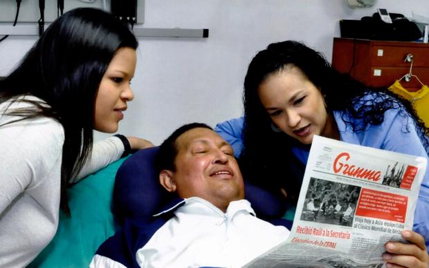 Hugo Chavez with his daughters, Maria Gabriela, left, and Rosa Virginia 