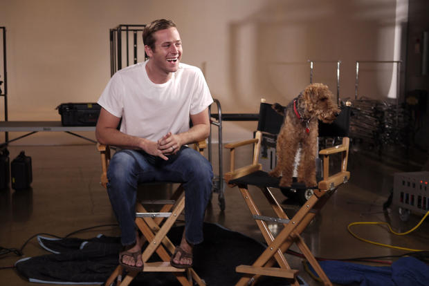 Armie Hammer's dog, Archie, jumped into a chair after the interview, getting some screen time of his own.  