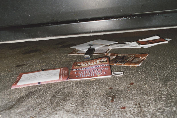 The crime scene: Several high school and college basketball programs and schedules were found around and under Kent Heitholt's car.   