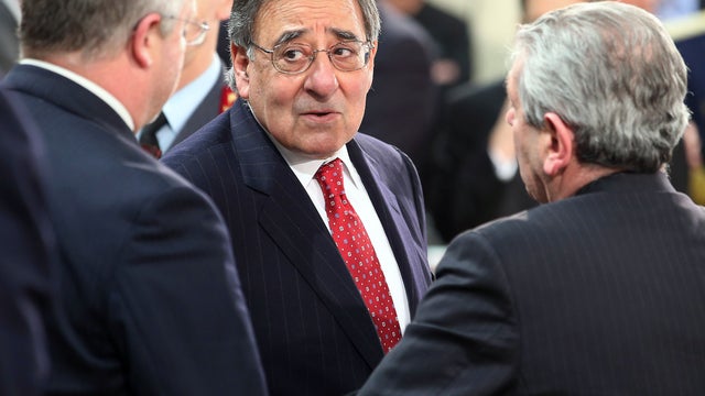 U.S. Secretary of Defense Leon Panetta talks with Italian Defense Minister Giampaolo Di Paola, right, before a NATO meeting Feb. 21, 2013, at the organization's headquarters in Brussels. 