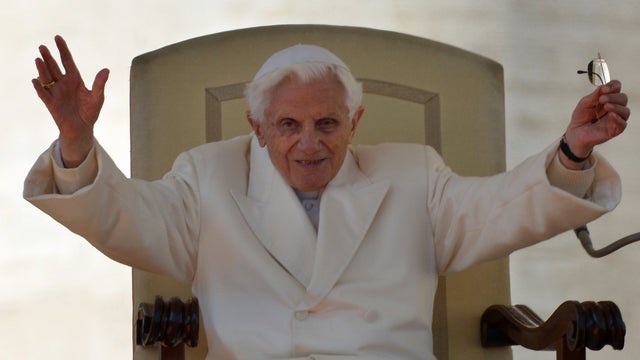 Pope Benedict XVI reacts during his last weekly audience  