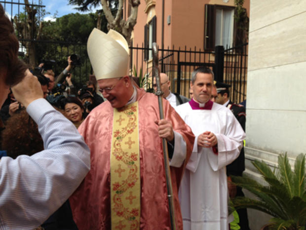 Cardinal Dolan entering Our Lady of Guadalupe Church 