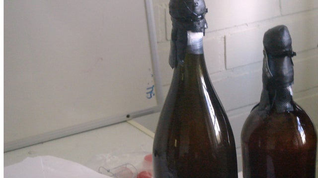 In this image released on Sept. 2, 2010, by the Alands Provincial Government, bottles of what are claimed to be the world's oldest surviving beer are displayed. Divers found the beer while salvaging champagne bottles from a shipwreck discovered near the A 