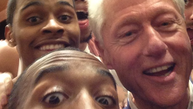 Bill Clinton celebrates with Louisville players 