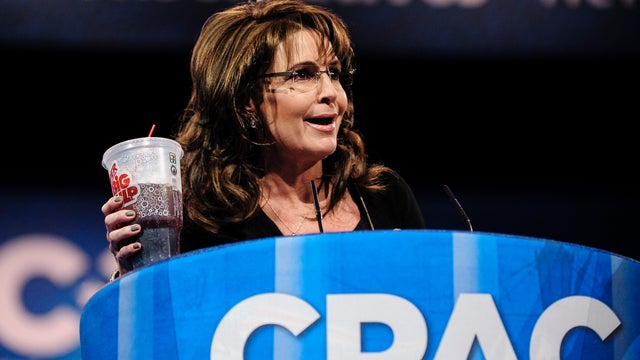 Sarah Palin, former Governor of Alaska, holds up a large soda as she speaks about New York City Mayor Michael Bloomberg's proposed large soda ban, at the 2013 Conservative Political Action Conference (CPAC) March 16, 2013 in National Harbor, Maryland. The 