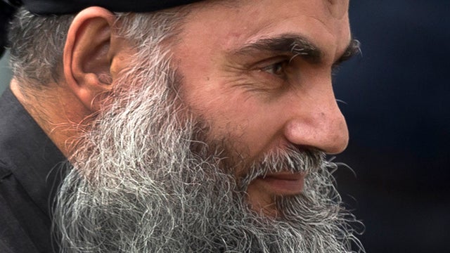 Abu Qatada arrives back at his residence in London after being freed from prison Nov. 13, 2012. 